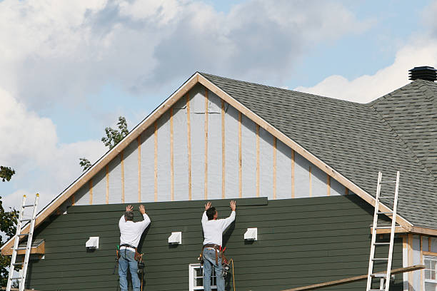 Professional Siding Installation technician working in Andover, OH